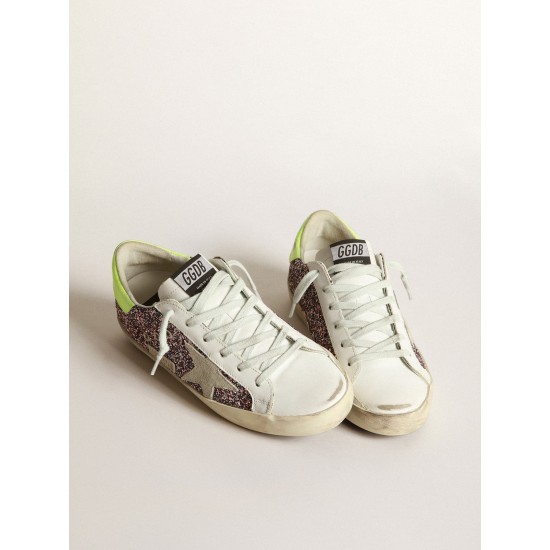 Super-Star sneakers in gray and pink glitter with ice-gray suede star and fluorescent yellow leather heel tab Super-Star sneakers in gray and pink glitter with ice-gray suede star and fluorescent yellow leather heel tab