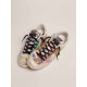 Super-Star sneakers in white leather with multicolored graffiti print Super-Star sneakers in white leather with multicolored graffiti print