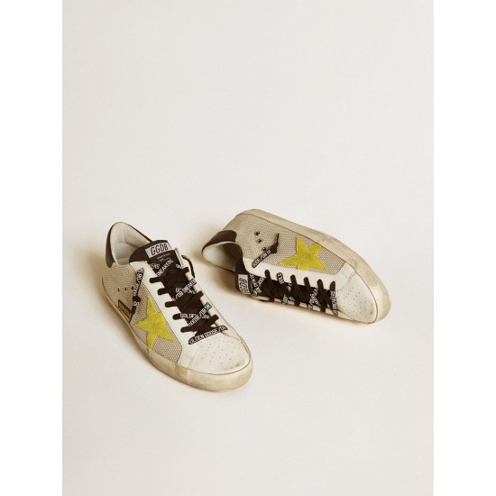 Super-Star in mesh with yellow suede star and black leather heel tab Super-Star in mesh with yellow suede star and black leather heel tab