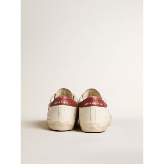 Men's Super-Star LTD in suede with green metallic star and red heel tab Men's Super-Star LTD in suede with green metallic star and red heel tab