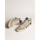 Slide in beige mesh and nylon with blue leather star and flash Slide in beige mesh and nylon with blue leather star and flash