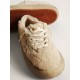 Men’s Space-Star shoes in beige shearling with white leather star and metallic leather heel tab Men’s Space-Star shoes in beige shearling with white leather star and metallic leather heel tab