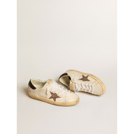 Super-Star LTD with laminated leather star and black glitter heel tab Super-Star LTD with laminated leather star and black glitter heel tab
