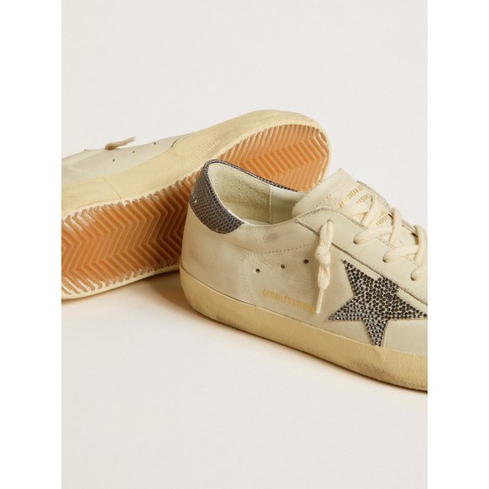 Super-Star LTD with cream-colored leather star with Swarovski crystals and blue leather heel tab with lizard print Super-Star LTD with cream-colored leather star with Swarovski crystals and blue leather heel tab with lizard print