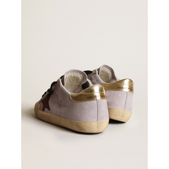 Super-Star in lilac suede with a brown star and gold heel tab Super-Star in lilac suede with a brown star and gold heel tab