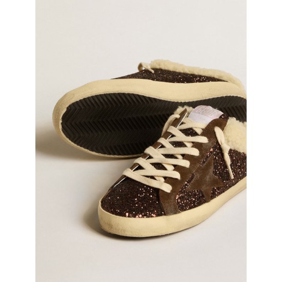 Super-Star Sabots in glitter with brown star and shearling lining Super-Star Sabots in glitter with brown star and shearling lining