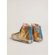 Francy Penstar in gold glitter with suede star and bright blue heel tab Francy Penstar in gold glitter with suede star and bright blue heel tab