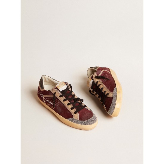 Women’s Super-Star Penstar LAB in burgundy suede with perforated star Women’s Super-Star Penstar LAB in burgundy suede with perforated star