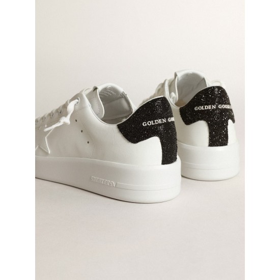 Purestar in white leather with tone-on-tone star and heel tab in black Swarovski crystals Purestar in white leather with tone-on-tone star and heel tab in black Swarovski crystals