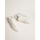 Women’s bio-based Purestar with white star and mirror-effect heel tab Women’s bio-based Purestar with white star and mirror-effect heel tab