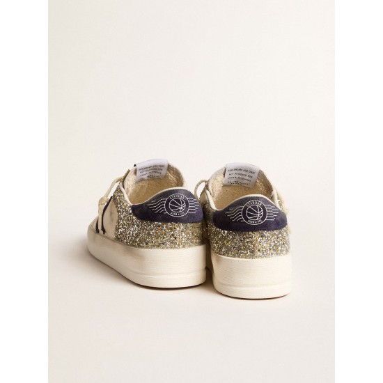Stardan in platinum glitter with dark blue suede star and heel tab Stardan in platinum glitter with dark blue suede star and heel tab