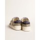 Stardan in platinum glitter with dark blue suede star and heel tab Stardan in platinum glitter with dark blue suede star and heel tab