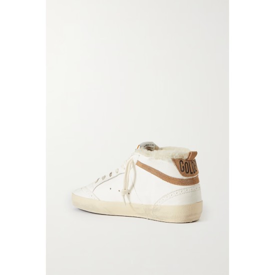 Mid Star shearling-lined distressed leopard-print calf hair, suede and leather sneakers Mid Star shearling-lined distressed leopard-print calf hair, suede and leather sneakers